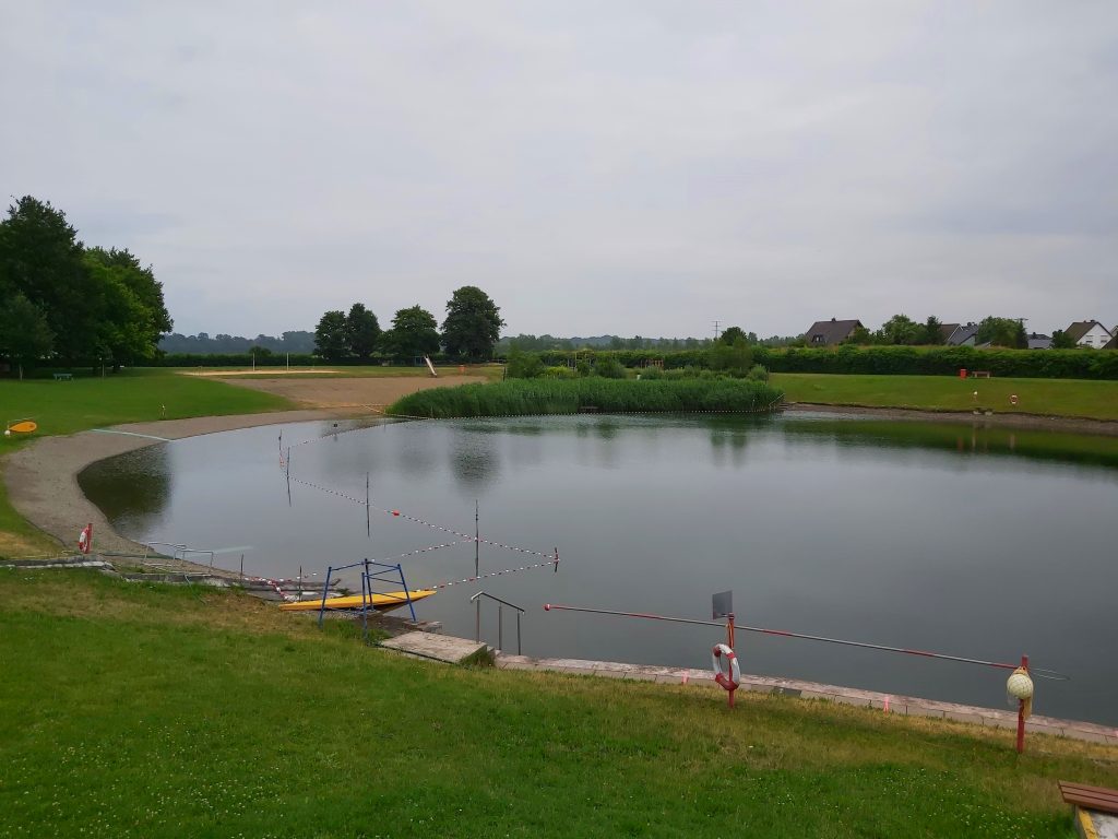 View of natural swimming lake schladen.